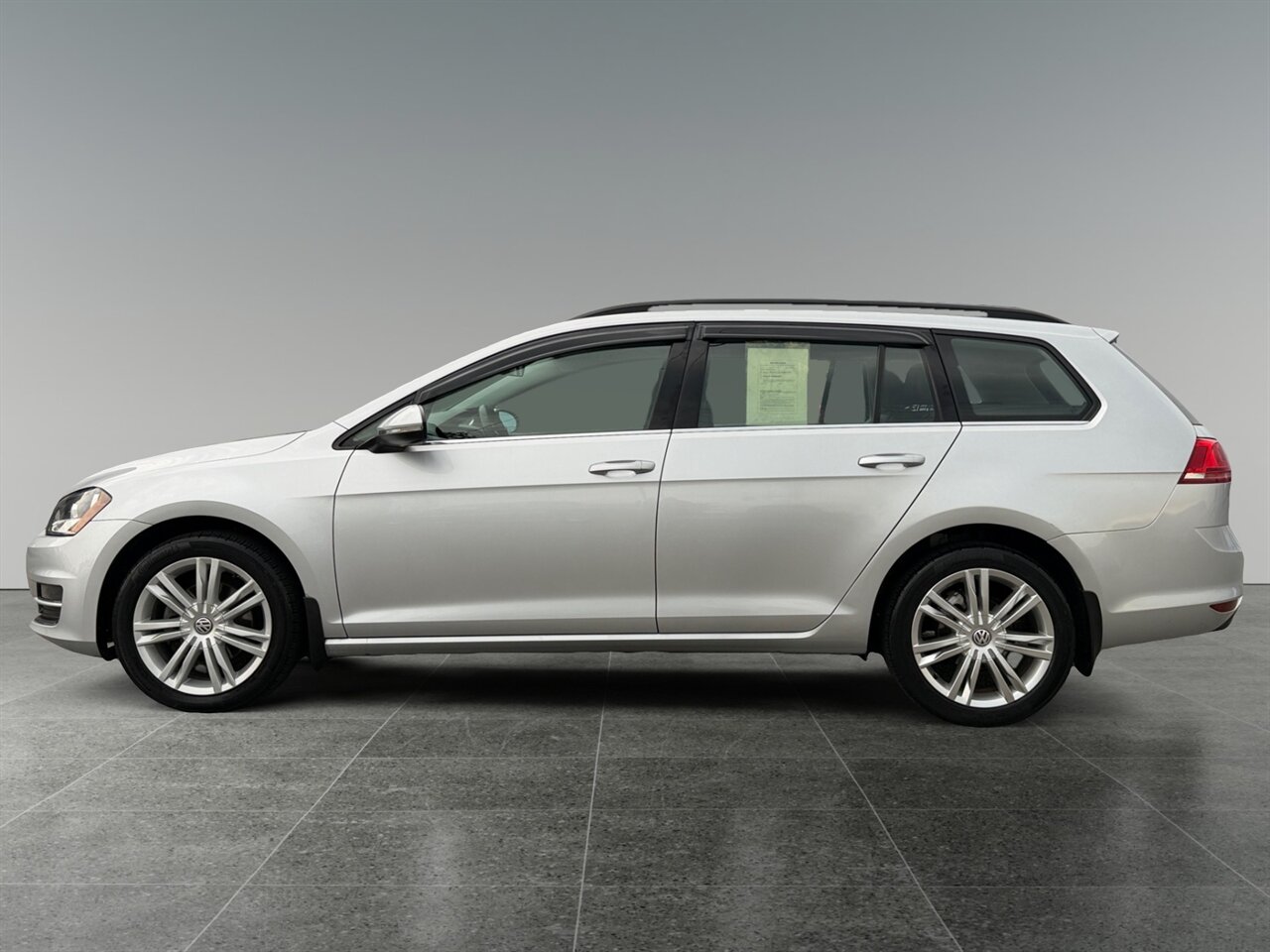 2015 Volkswagen Golf Sportwagen TDI SE in Silver — photo 2 of 22